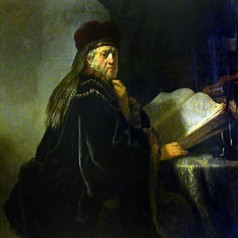 A Scholar Seated at a Table with Books