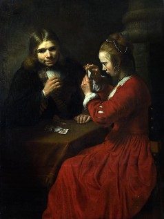 A Young Man and a Girl playing Cards