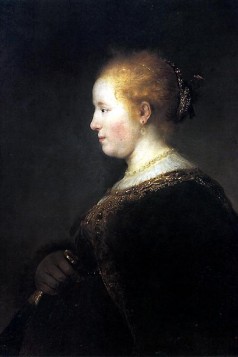 A Young Woman in Profile with a Fan